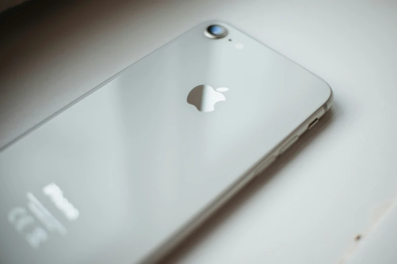 an apple iphone is displayed on the table