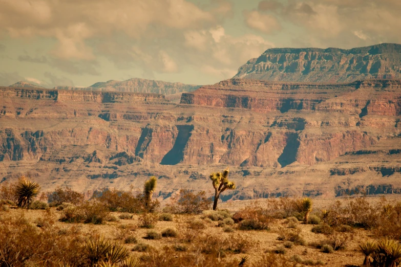 a scenic scene of a mountain in a desert