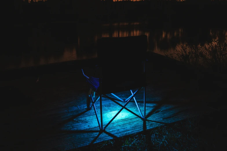 a chair that is sitting on a wooden platform