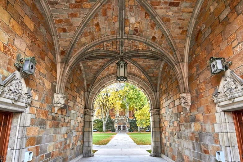 looking through an archway with many carvings on it