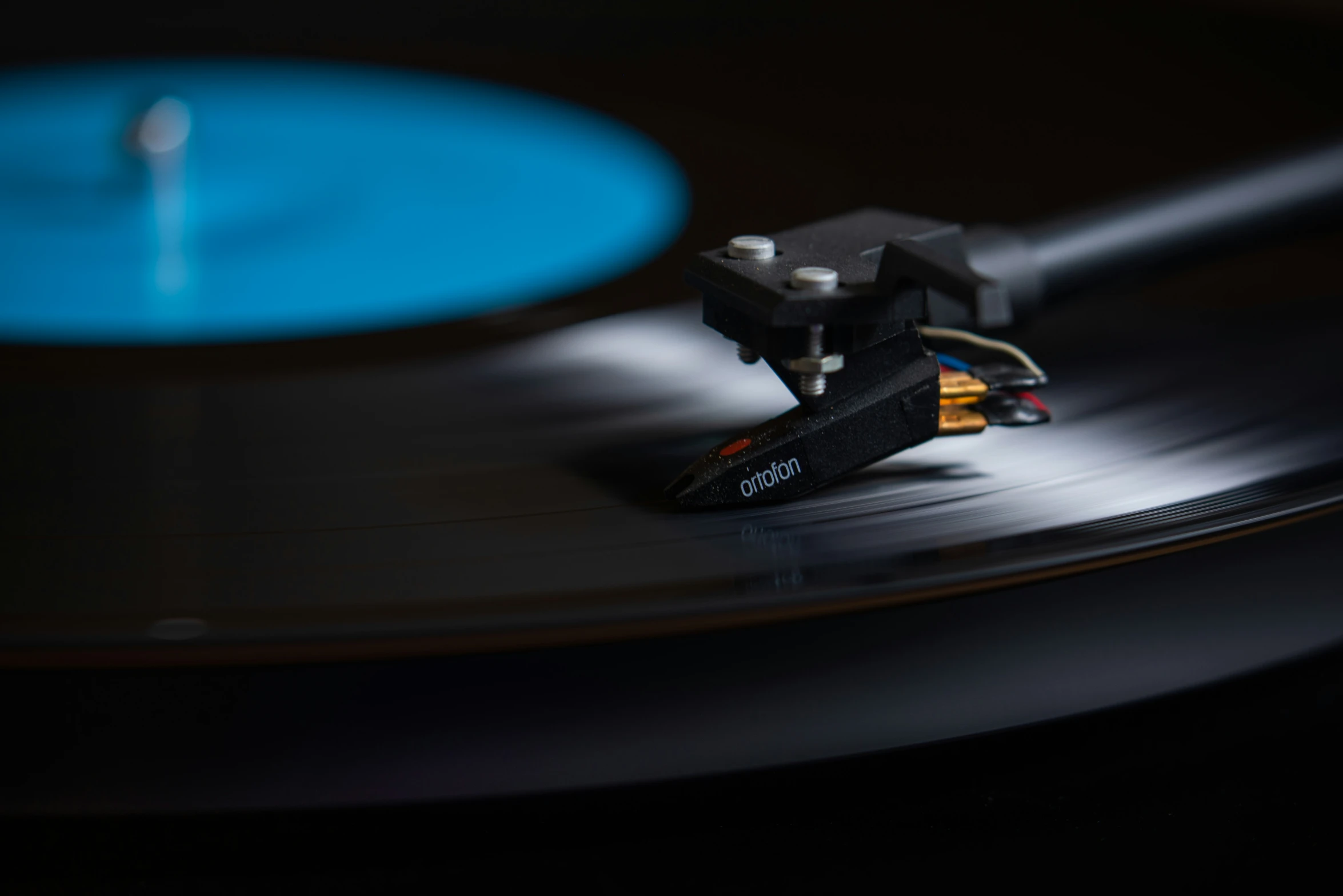 the record player is spinning it on its turntable