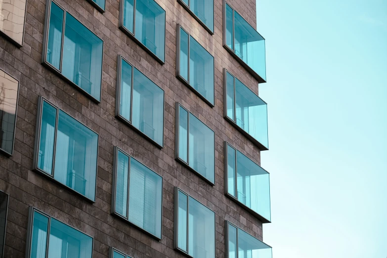 an outside view of a building with open windows