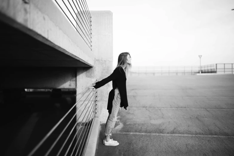 a person standing by the stairs on their skateboard