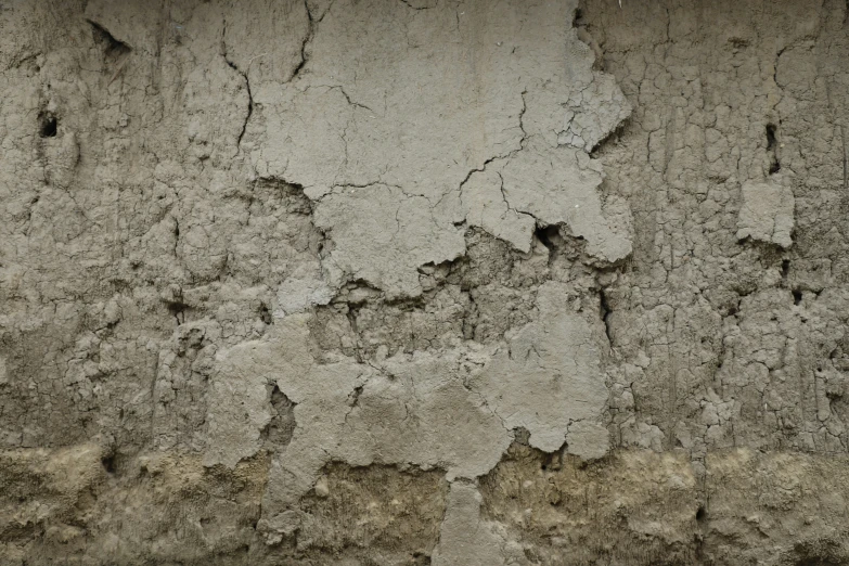 the background of an old, grungy concrete wall