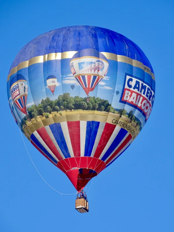 a  air balloon has the name campbell bald on it's side