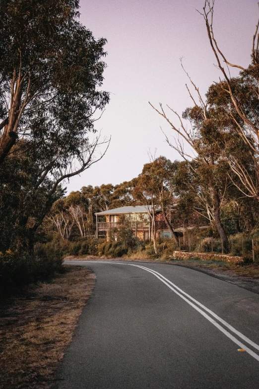 a house that is in the middle of some trees