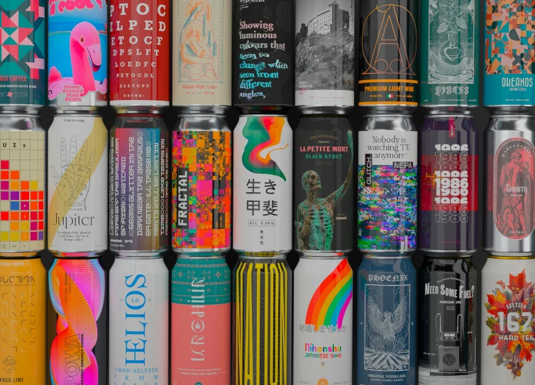 various colorful cans with some type of drink on top