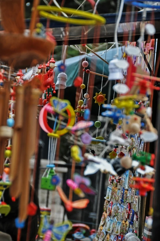 a store front with mobile phone and string