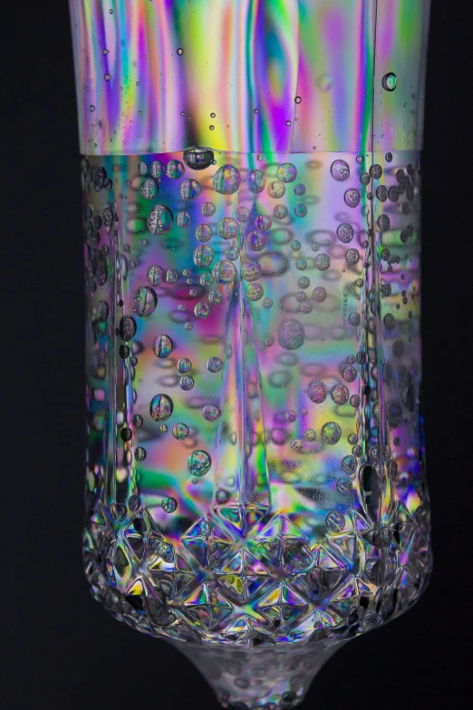 an image of a vase with a liquid layer on it