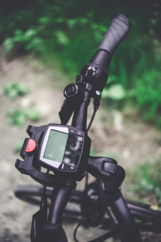 a camera mounted on the handle of a bicycle