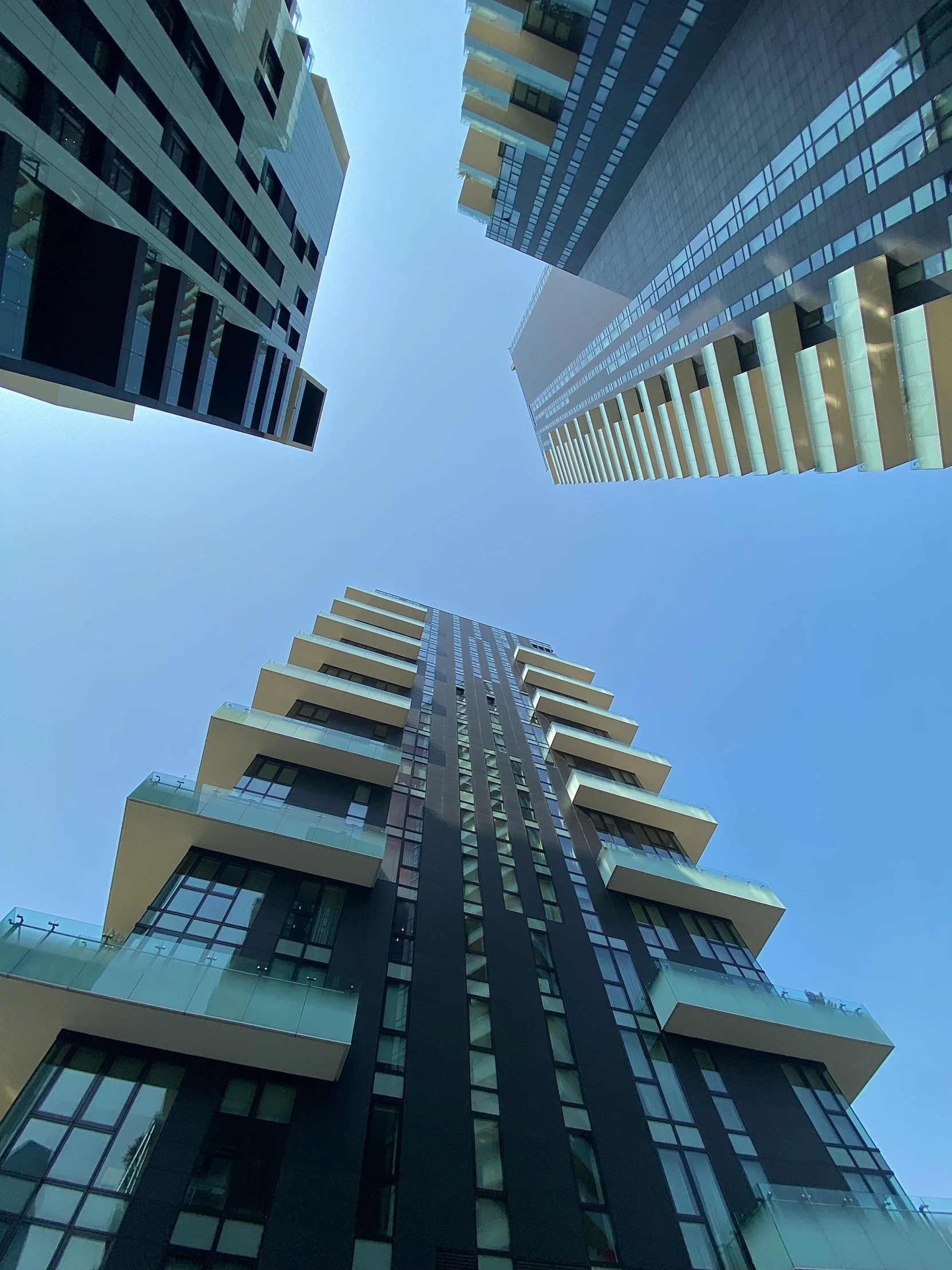 looking up at the architecture of a high rise