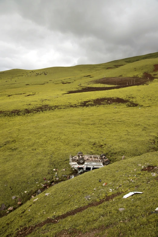 old pickup truck sitting abandoned in a field