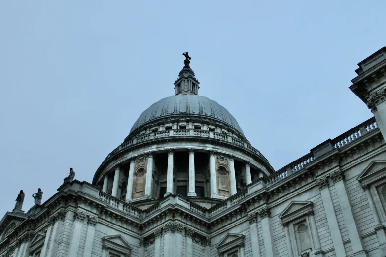 a white building with an ornate dome on top of it