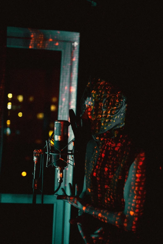 a woman in a hat with sound equipment