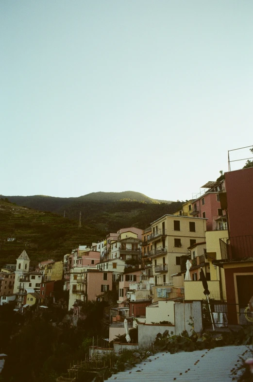 some buildings are on the side of a hill