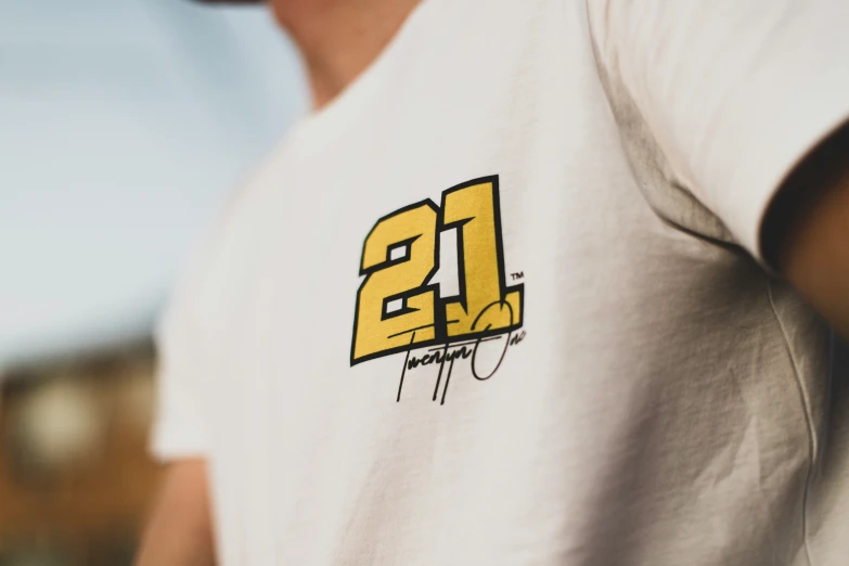 this is an image of the number 21 on a white shirt