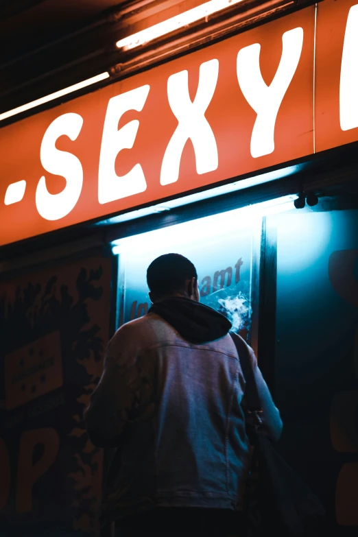 a person walks into an asian sex shop