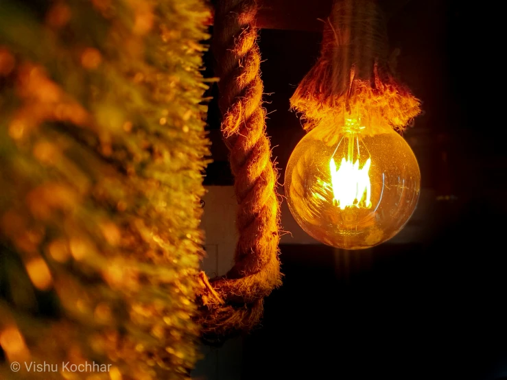 a close up of an orange light fixture
