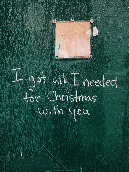 an image of a green sign saying i got all i needed for christmas with you