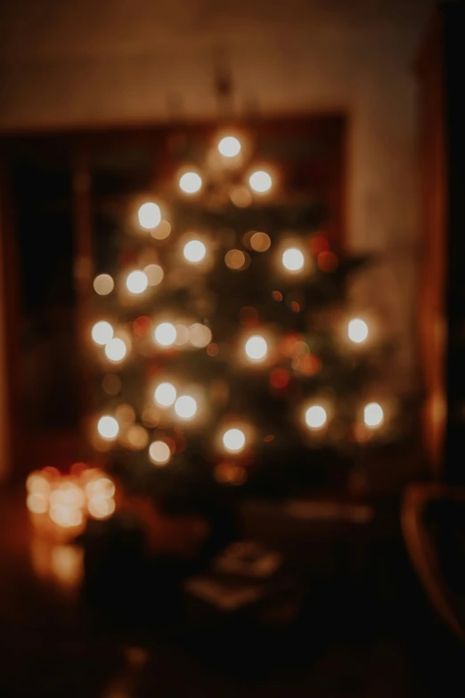 a blurry pograph shows the inside of a decorated christmas tree