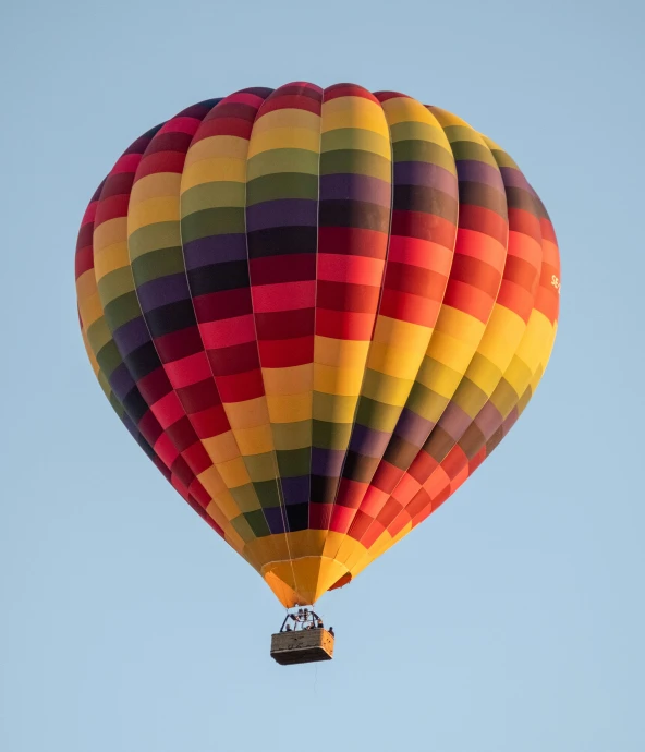 there is a large  air balloon up in the sky