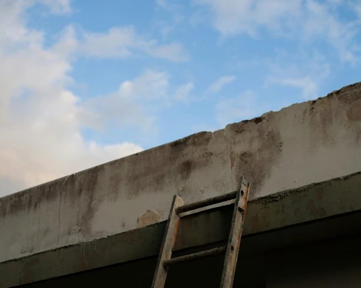 a ladder leaning up against a wall