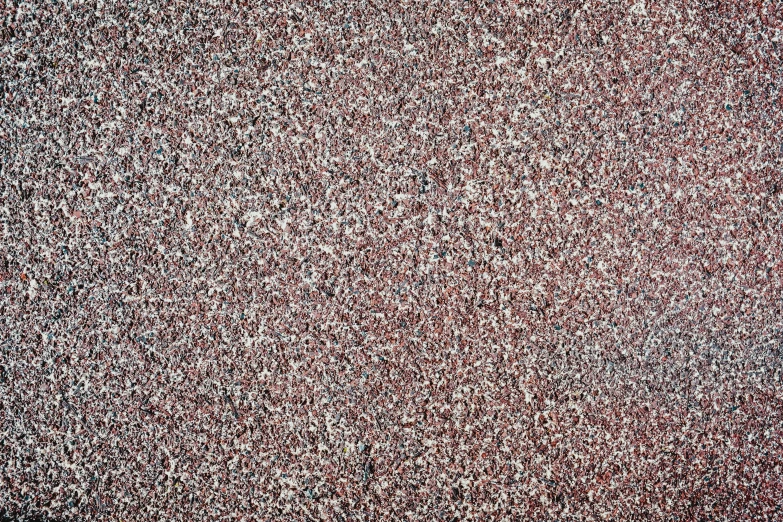 a background texture with small speckles in brown