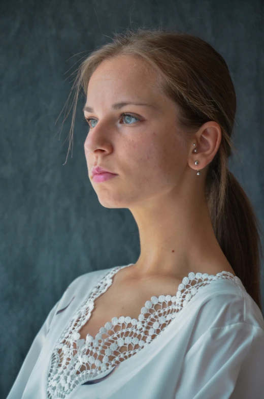 a pretty young lady looking up and to the side