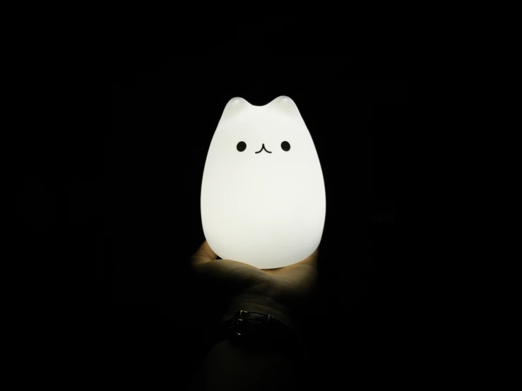 an electric light shaped like a cat