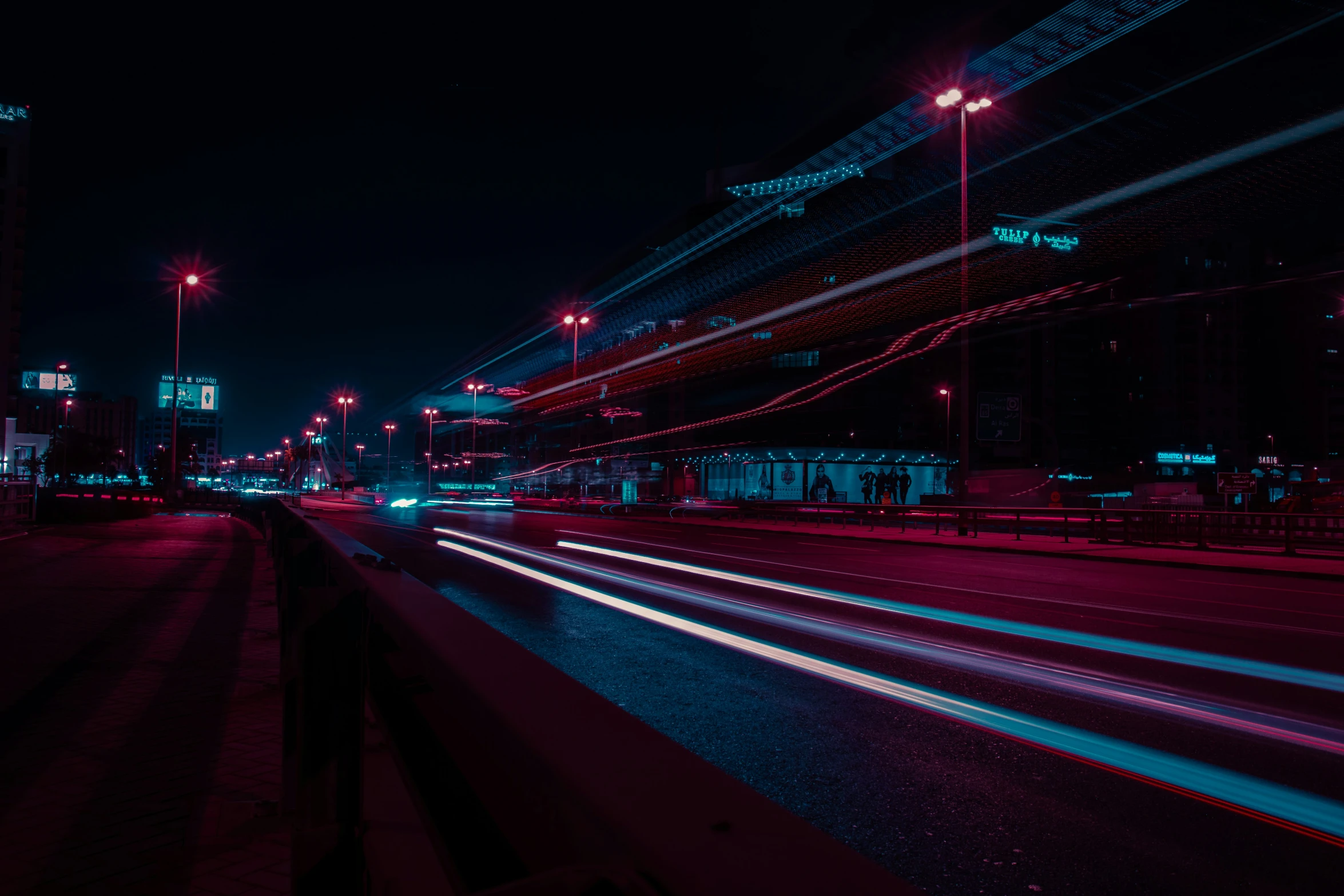 a night scene of an industrial area with the lights and streaks