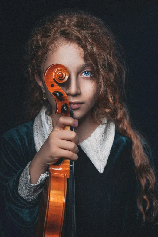  with long, red hair and blue eyes holding a violin