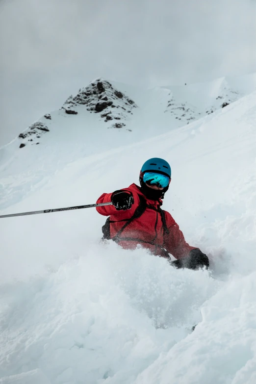 a skier is doing tricks in the snow