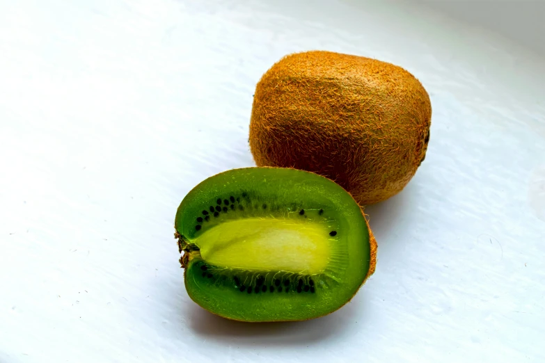 an image of two kiwis that are sitting on a table