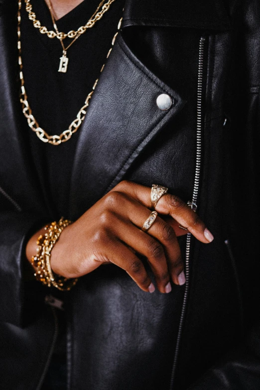 a close up of a person with a leather jacket