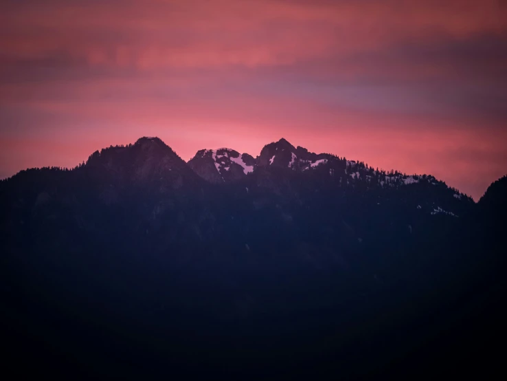 some very pretty mountains with a sky in the background