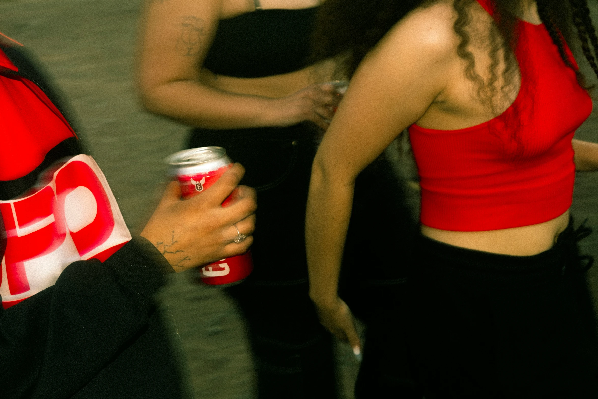 two young women talking to each other near each other