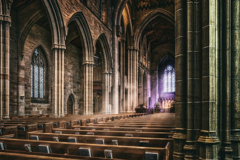 the interior of a church with pews