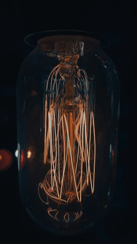 a large jar that has some lights in it