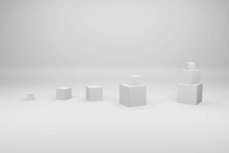 a white table in front of three white rectangular boxes