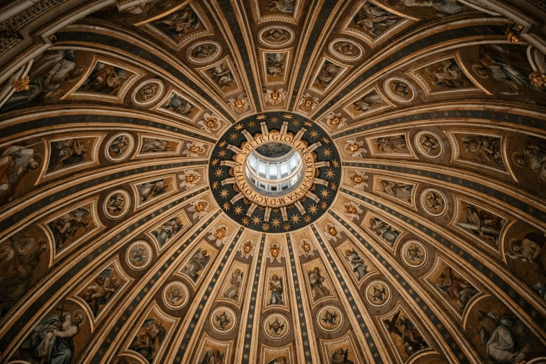 an intricate ceiling of a cathedral with painted decorations