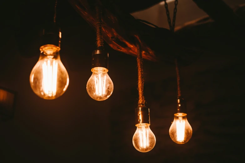 light bulbs hanging off of a ceiling