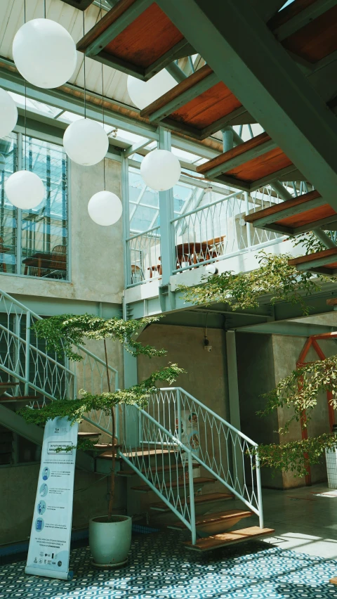 the outside area of a building with stairs leading up to it