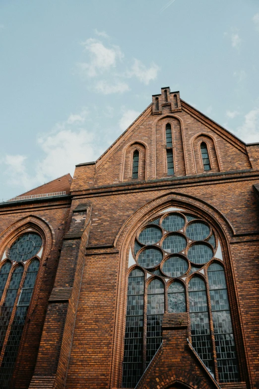 an old church with many large windows