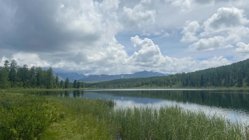 an image of a landscape with mountains in the background