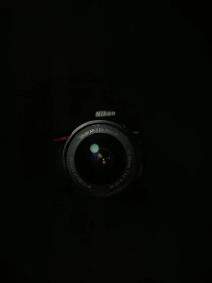 a camera that is in the dark with a light on