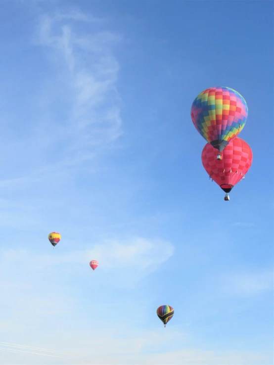 a bunch of  air balloons in the sky