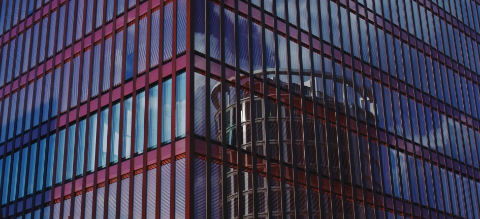 the reflection of a building from another building