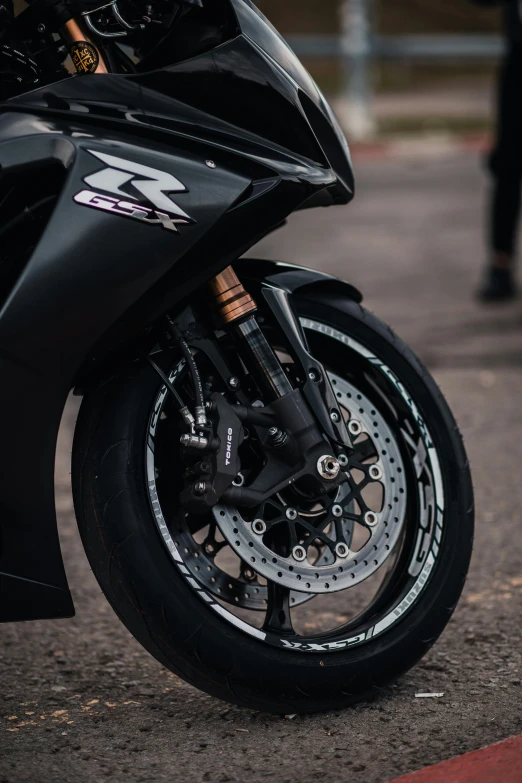 a motor cycle is parked in the street