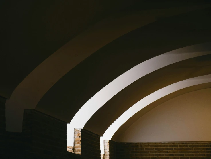 a long hall filled with walls covered in archways