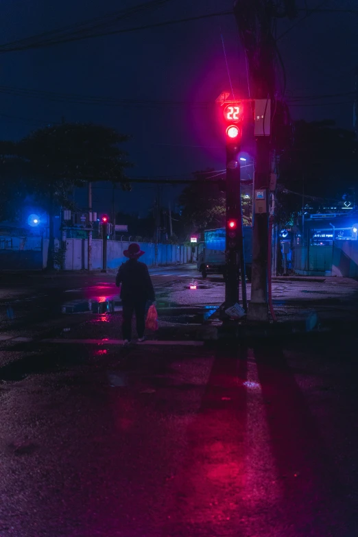 a red light on a busy city street with no traffic